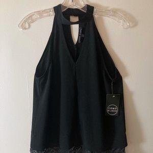 Black halter. V neck cutout.